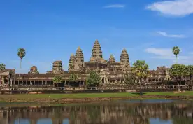 Angkor Wat temple complex being reflected in the water in Cambodia, Southern Asia