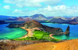 Bartolome Island surrounded by beaches and green glistening waters