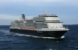 Side view of a cruise ship in transit along the ocean