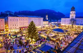 Aerial view of Salzburg's Christmas Market illuminated at night in Austria