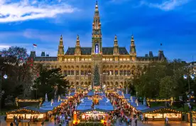 Traditional Christmas market at Vienna Town Hall at night in front of town hall