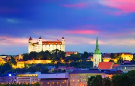 View of Bratislava Castle from the river under a colour evening sky