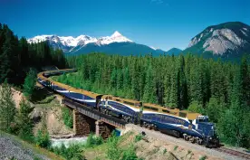 A landscape shot of the Rocky Mountaineer train