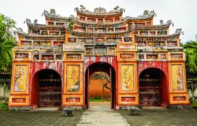Large, colorful temple entrance to the temple Thế Miếu, Hue, Vietnam