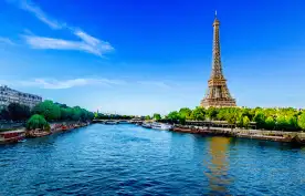 View of the Eiffel Tower and river Seine on a sunny day in Paris, France