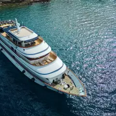 Yacht ship anchored in the crystal blue waters of a croatian bay