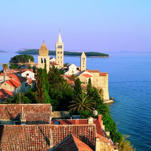 Elevated view of medieval Rab Bell Towers and town, Rab Town, Rab Island, Dalmatia, Dalmatian Coast, Croatia, Europe