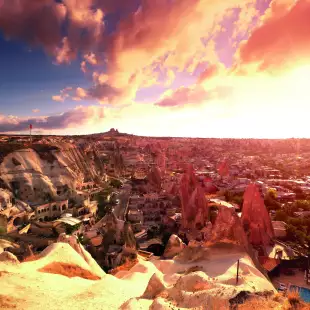 Ancient Göreme town and castle of Uçhisar at Sunset in Nevşehir, Turkey