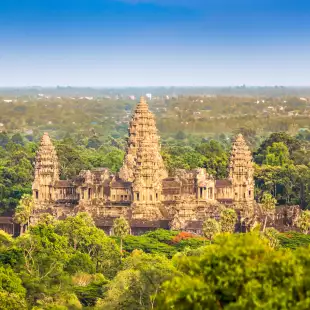 View over tropical forest and the Angkor Thom Temple in Siem Reap, Cambodia