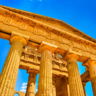 Ruins of ancient temple front pillars in Agrigento, Sicily, Italy