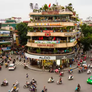 View of the traffic in front of the City View Café building in Hanoi, Vietnam