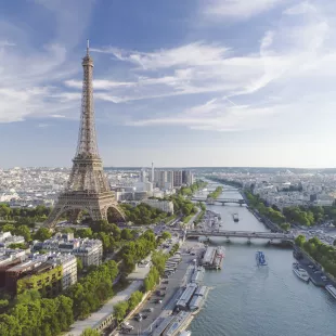 Aerial view of Paris with Eiffel tower and Seine river during sunset, France