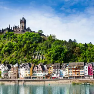 Imperial Castle on mountain with houses overlooking Mosel river in Cochem, Germany