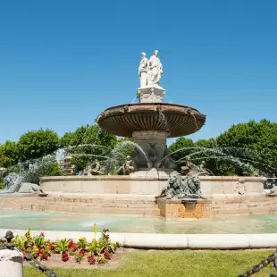 Big fountain in the middle of the French city Aix-en-Provence