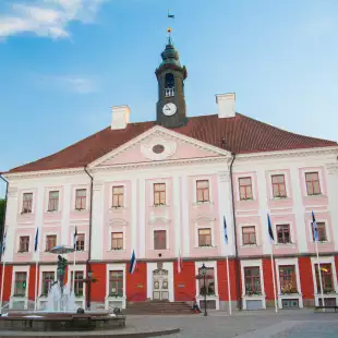 Front view of Tartu City Town Hall and fountain, located in Town Hall Square