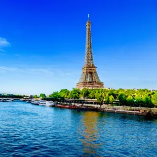 View of the Eiffel Tower and river Seine on a sunny day in Paris, France