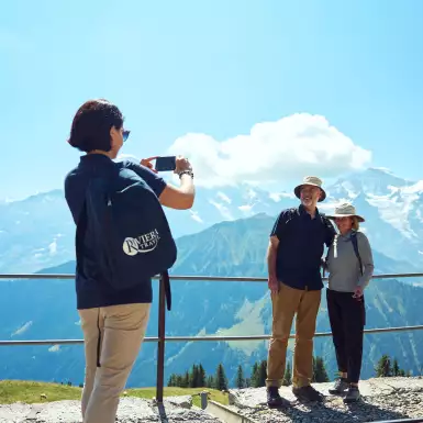 Riviera Tour Manager taking couples photo in Switzerland