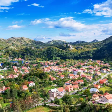 Aerial shot of country houses in Cetinje city, Montenegro