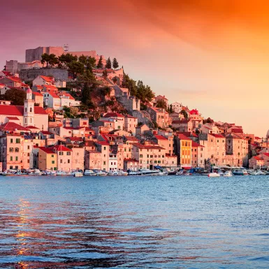 Beautiful sunset across the hilltop city of Sibenik in Croatia