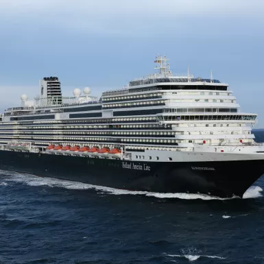 Side view of a cruise ship in transit along the ocean
