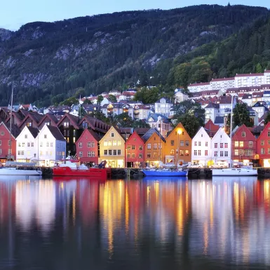 Colourful city of Bergen illuminated at night in Norway