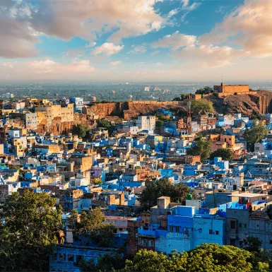 Aerial shot of Jodhpur town with blue and white buildings in Rajasthan, India