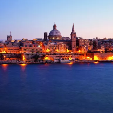 View of Valletta illuminated at night in Malta