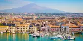 Beautiful view of Catania cruise port with smoking volcano Etna in the background