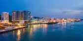 Aerial view of Kota Kinabalu city in the evening along the water, Malaysia