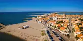 Aerial view of Saintes-Maries-de-la-Mer and beach in France