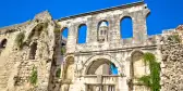 White historical landmark, SIlver Gate in the heart of sunny Split old town