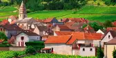 Burgundian Village with terracotta roofed white buildings in Burgundy, France