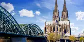 Cologne Cathedral and bridge on a beautiful summer day in Cologne, Germany