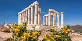 Cape Sounion with ruins of an ancient Greek temple of Poseidon in Attica, Greece