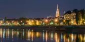 River Drva coast reflection by night in city Osijek, Croatia