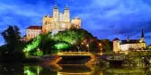 Twilight view of Melk Abbey overlooking the Danube river in Austria