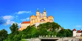 View of the Benedictine Melk Abbey and water reflections in Austria