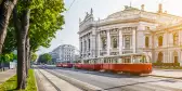 Wiener Ringstrasse with Burgtheater and tram at sunrise, Vienna, Austria