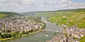 View from Landshut Castle to the old town Bernkastel-Kues with vineyards and river Mosel in summer, Germany Europe