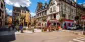 Street view of beautiful buildings and cafes in Rouen Old Town, Normandy, France