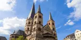 Street view of the steeples of Bonn Minster church, Germany
