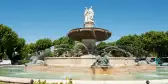 Big fountain in the middle of the French city Aix-en-Provence