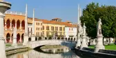 Padua city with statues and mini bridge over water, Italy