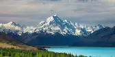 Bright blue water infront of the New Zealand National Park, Mt Cook