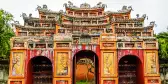 Large, colorful temple entrance to the temple Thế Miếu, Hue, Vietnam