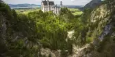 View of the Neuschwanstein fairytale like castle surrounded by greenery