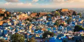 Aerial shot of Jodhpur town with blue and white buildings in Rajasthan, India