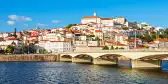 View of Coimbra city from the Mondego River in Portugal