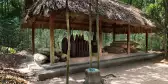 Sheltered war bombs and combat equipment at Cu Chi Tunnel in Vietnam