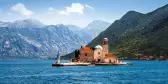 View of man-made island, 'Our Lady of the Rock' in the Bay of Kotor, Montenegro